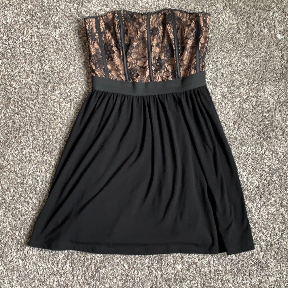 Black cocktail dress with corset style top